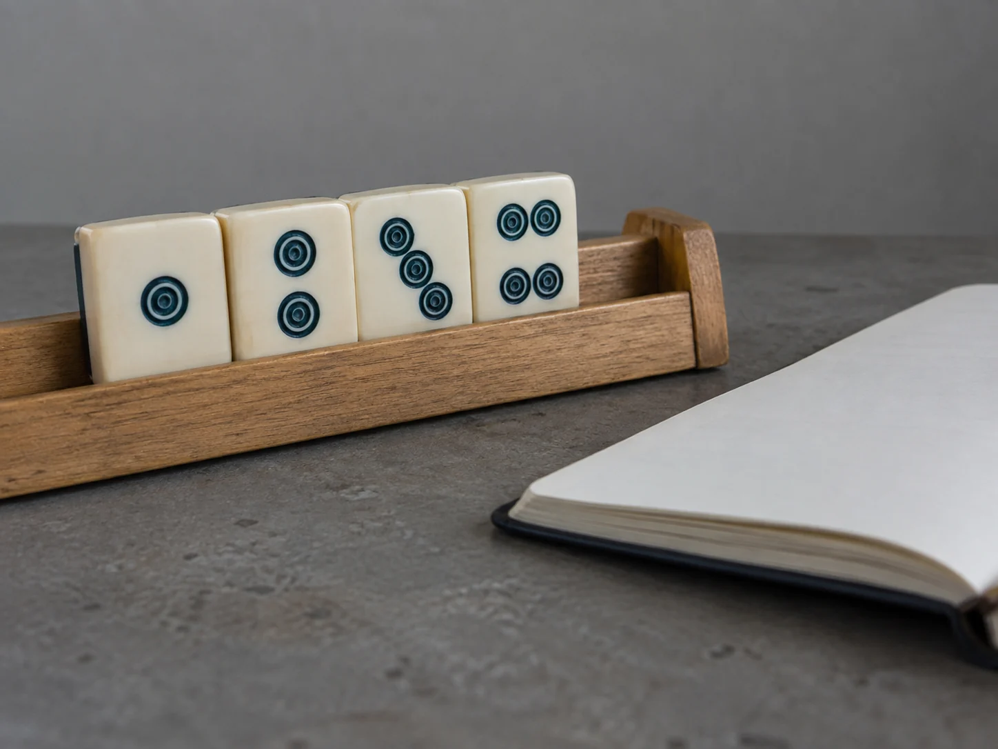 Learning American mahjong: the card, the Charleston and your first table — illustrative editorial photograph