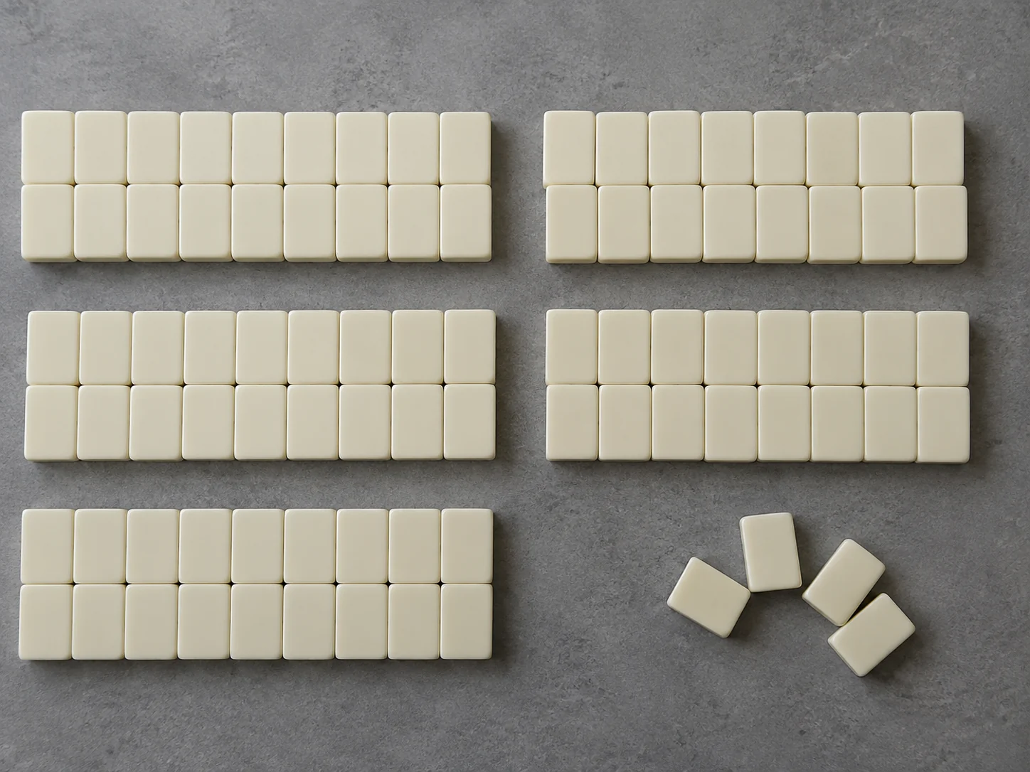 152, 160 or 166 tiles: what an American mahjong set actually needs — illustrative editorial photograph