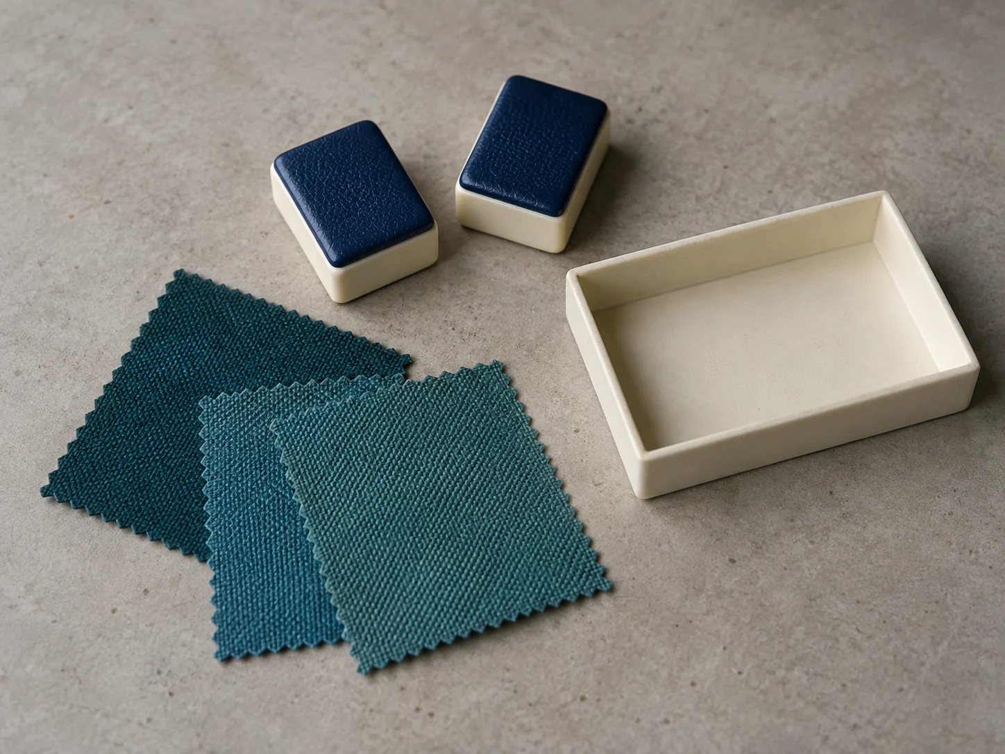 Mahjong tile back samples with teal fabric swatches
